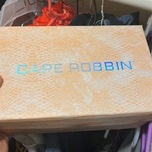 black cape robbin heels , perfect for events and in good shape